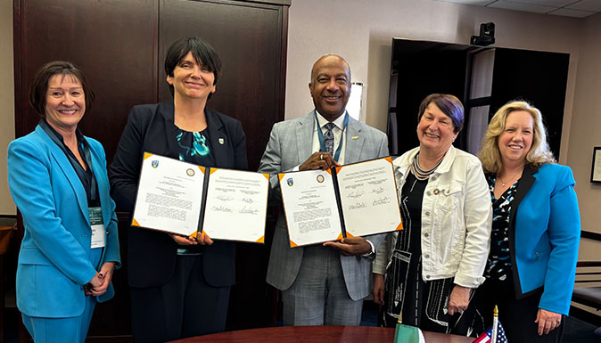 University College Dublin and UC Davis Presidents and VPs signing agreement